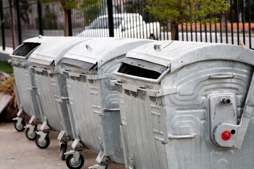 Business professional managing waste removal in Golders Green